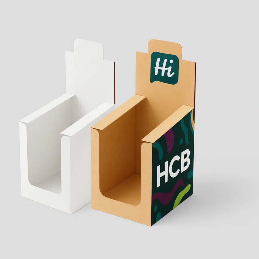 Two tall counter display boxes- one white- one printed Kraft with abstract design and logo- class=